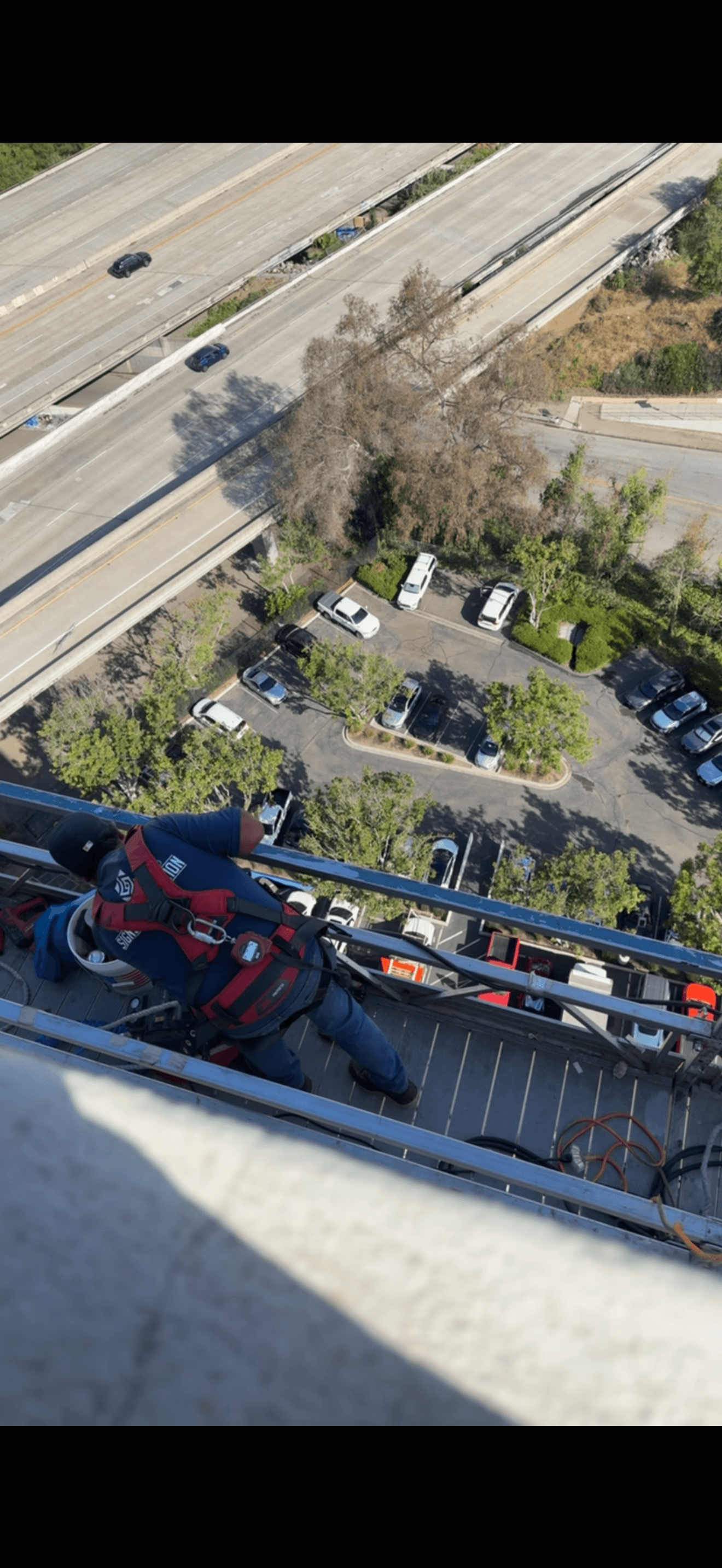 Aerial view of tower sign installation