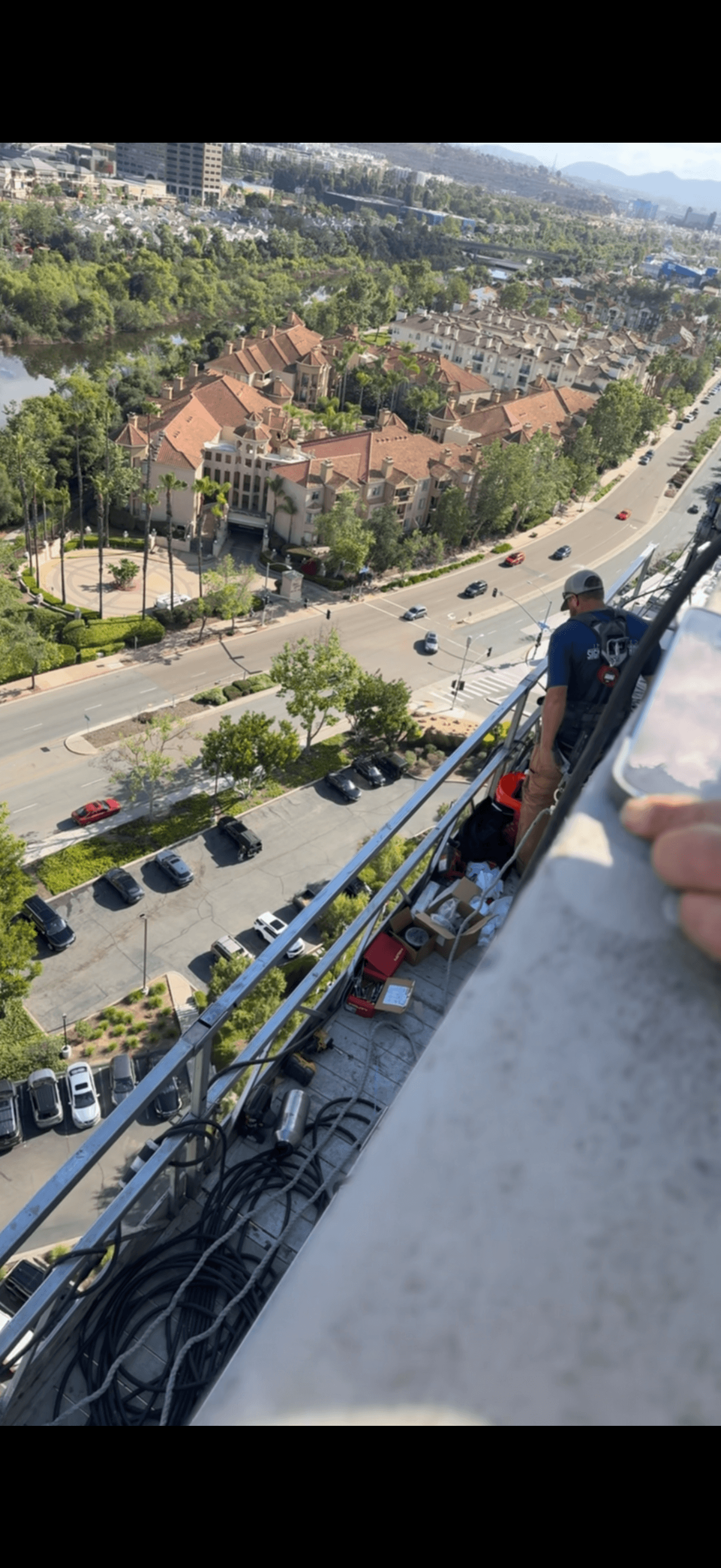 Tower sign installation at height